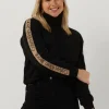 Calvin Klein Pull Logo Tape Sleeves Roll Neck En Noir Satisfait ou Remboursé 19