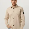 Calvin Klein Surchemise Monologo Badge Relaxed Shirt En Beige remise en ligne 17